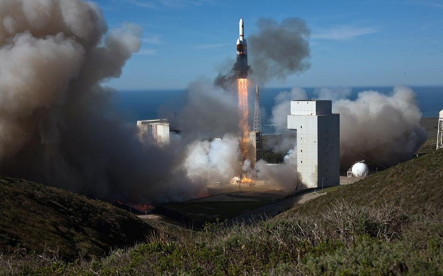 With the Pacific Ocean in the background, a rocket launches from Vandenberg Air Force Base, Calif. on Jan. 21, 2011. 