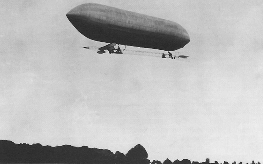 A U.S. Army dirigible flies above Fort Myer, Va., in 1908. 