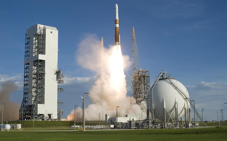 Smoke and steam roll across Launch Complex 37 at Cape Canaveral Air Force Station in Florida as a Delta IV rocket clears the tower in this June 2009 photo.