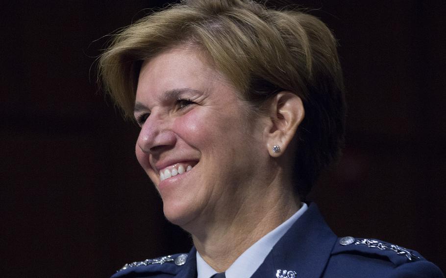 Gen. Lori J. Robinson laughs at a lighthearted remark by Sen. John McCain during a Senate Armed Services Committee confirmation hearing on her nomination to serve as commander of the U.S. Northern Command, April 21, 2016 on Capitol Hill.
