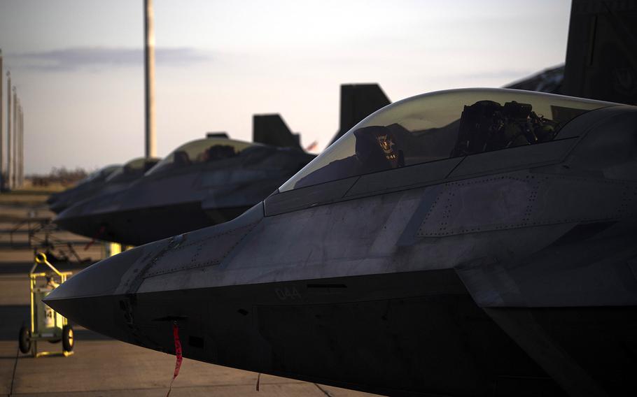 F-22 Raptors are parked near the runway at Tyndall Air Force Base, Florida, Oct. 15, 2018.