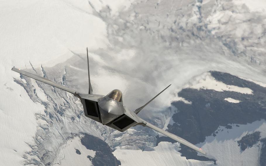 A U.S. Air Force F-22 Raptor from Joint Base Elmendorf-Richardson flies over the Joint Pacific Alaska Range Complex on July 18, 2019.