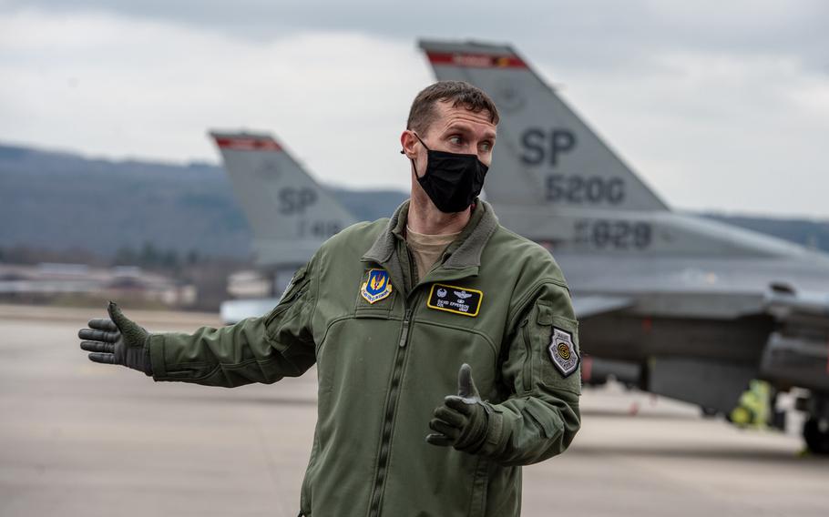 Col. David Epperson, commander of the 52nd Fighter Wing, discusses the importance of an agile combat employment exercise on the flight line at Ramstein Air Base, Germany, March 22, 2021. The Spangdahlem-based airmen are at Ramstein to practice quickly deploying personnel and aircraft to forward locations.   

