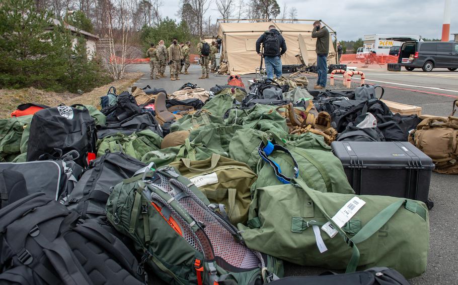 Bags pile up on the edge of the Ramstein Air Base, Germany, flight line as airmen arrive for an agile combat employment exercise, March 22, 2021. The Spangdahlem-based airmen are at Ramstein to practice quickly deploying to forward locations.   



