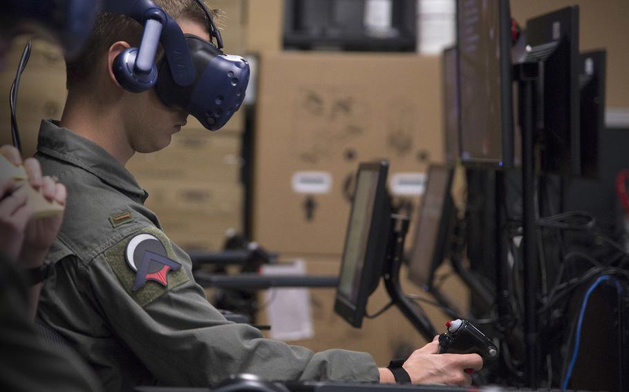 Second Lt. Austin Sneed, a Pilot Training Next student, trains on a virtual-reality flight simulator at the Armed Forces Reserve Center in Austin, Texas, on June 18, 2018. The training program is being used to redesign pilot training.