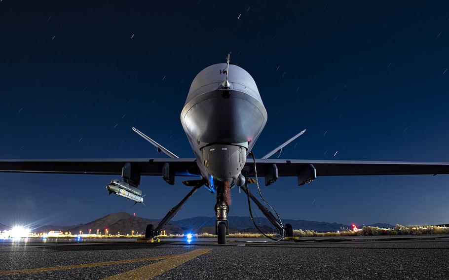 An Air Force MQ-9 Reaper armed with an AIM-9X Block 2 missile sits on the ramp at Creech Air Force Base, Nevada, Sept. 3, 2020. The drone is assigned to the 556th Test and Evaluation Squadron. 