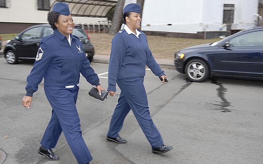 Master Sgt. Crystal David, left, and Tech. Sgt. Heather Mitchell wear their dress blue uniforms on Monday while walking on Ramstein Air Base, Germany. Some commands are doing away with the requirement that airmen wear blues every Monday, after Air Force Chief of Staff Mark Welsh III last week  gave major command commanders leeway to decide which uniform their airmen wear in order to better perform their mission.