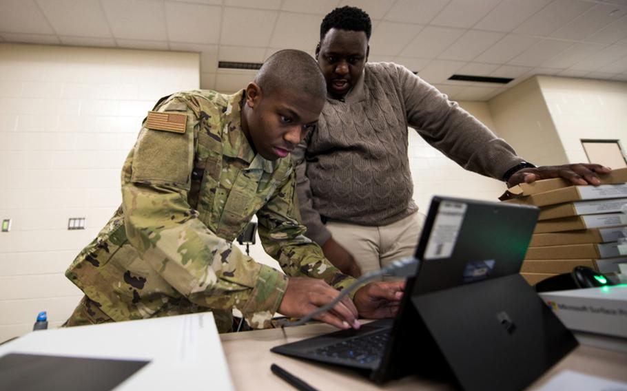 A trainee at Air Force basic military training signs into his new computer at Joint Base San Antonio-Lackland, Texas, Dec. 11, 2019, as part of an initiative that provides instructors with immediate feedback about trainee performance.