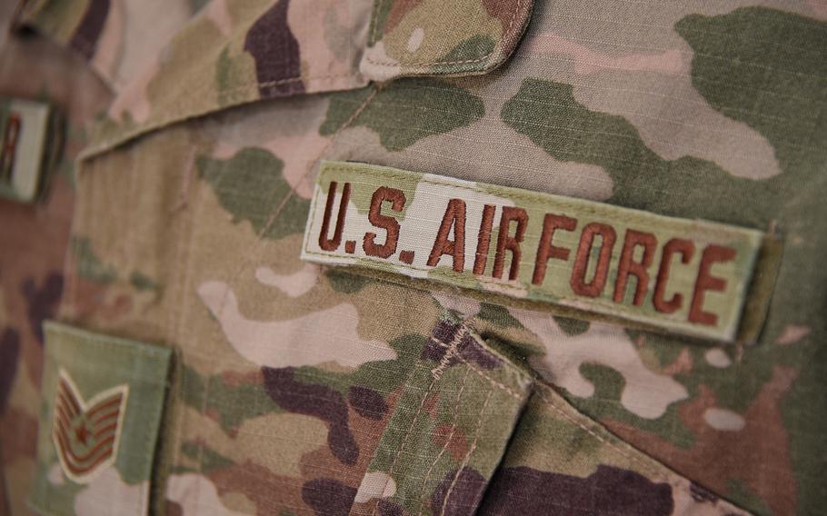 The Operational Camouflage Pattern uniform features Air Force specific spice brown name tapes.