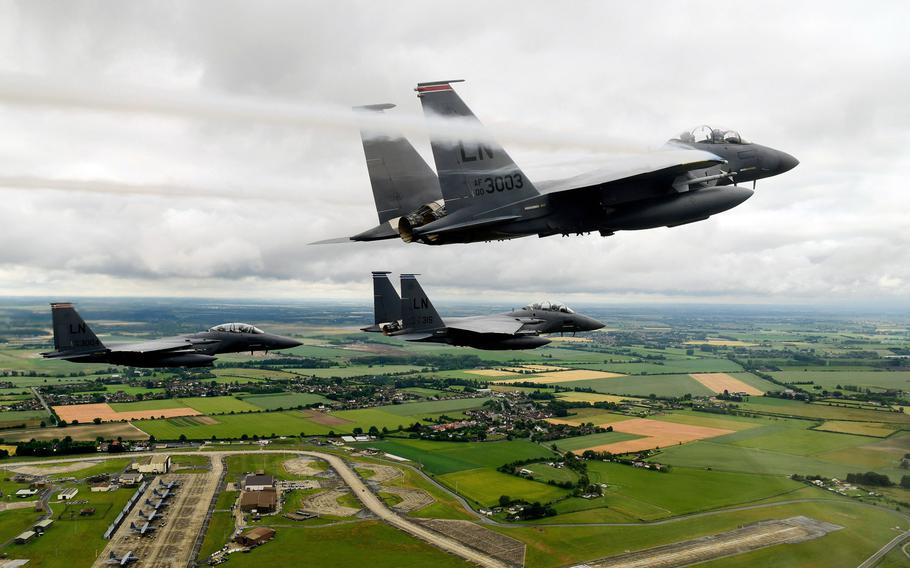 F-15E Strike Eagles from the 494th Fighter Squadron conduct a missing man formation on Thursday, June 19, 2020, in honor of 1st Lt. Kenneth "Kage" Allen, who died four days earlier when his F-15C fighter jet crashed in the North Sea.