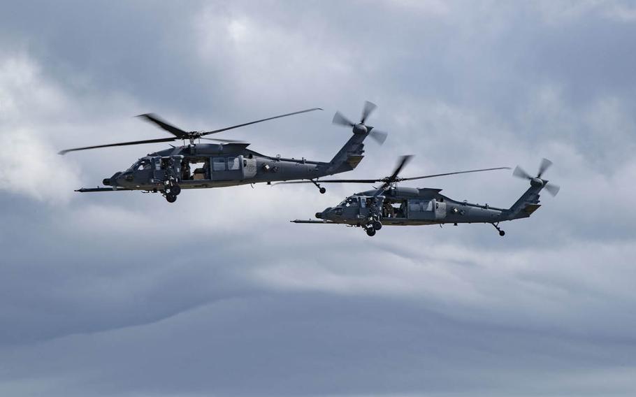 A pair of HH-60W Jolly Green II helicopters prepare to land at Moody Air Force Base, Ga., Nov. 5, 2020.