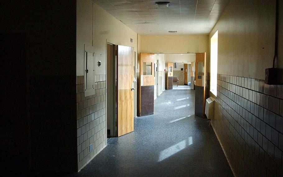 A hallway in an old military base hospital.