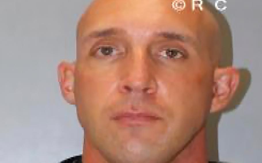 This April 14, 2021, booking photo provided by the Richland County, S.C., detention center shows Jonathan Pentland, an Army staff sergeant charged with third-degree assault and battery after a video went viral depicting him accosting and shoving a Black man in a Columbia, S.C., neighborhood. 