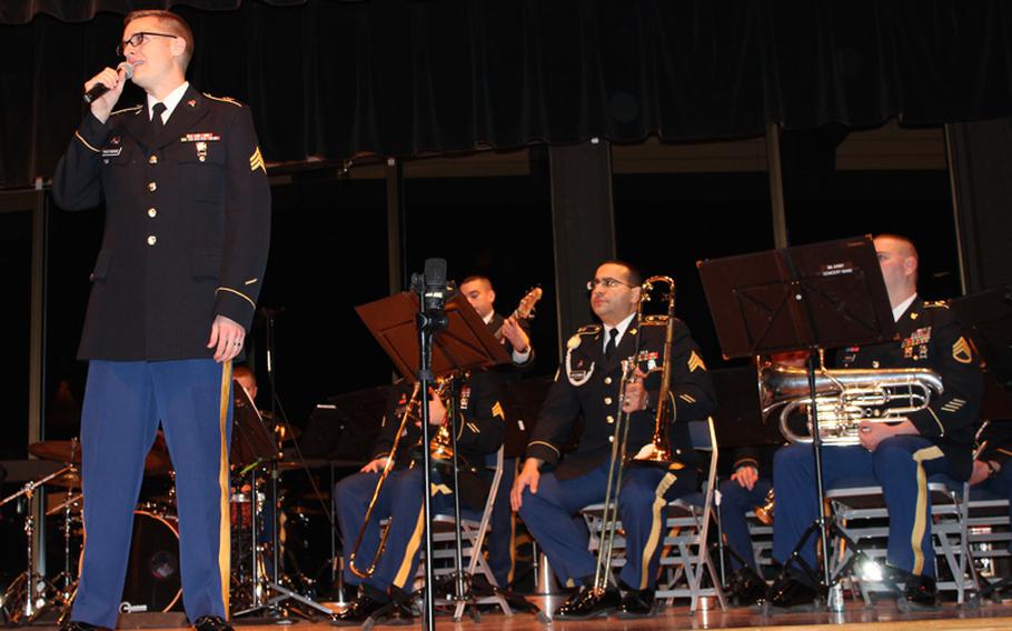 Ninth Army Band member Sgt. Thomas Borgerding of Fort Wainwright sings “America the Beautiful” Oct. 16 at a community concert at Harrigan Centennial Hall in Sitka, Alaska, in support of the city’s annual Alaska Day Festival. The festival is celebrated annually to commemorate the transfer of Alaska from Russia to the United States in 1867. 