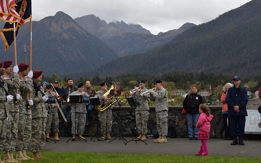 Paratroops from the 3rd Battalion (Airborne), 509th Infantry Regiment post the colors as the 9th Army Band plays "Alaska's Flag," the state song, atop Castle Hill in Sitka for Alaska Day ceremonies Saturday, Oct. 18. Alaska Day is celebrated as a state holiday, but no other city celebrates quite like Sitka, home of the original 1867 transfer ceremony which brought the Alaska Territory from Tsarist Russian to American control. Soldiers from the 9th U.S. Infantry were integral in the original ceremony, beginning a long, lasting relationship between the Army and Alaskans. 