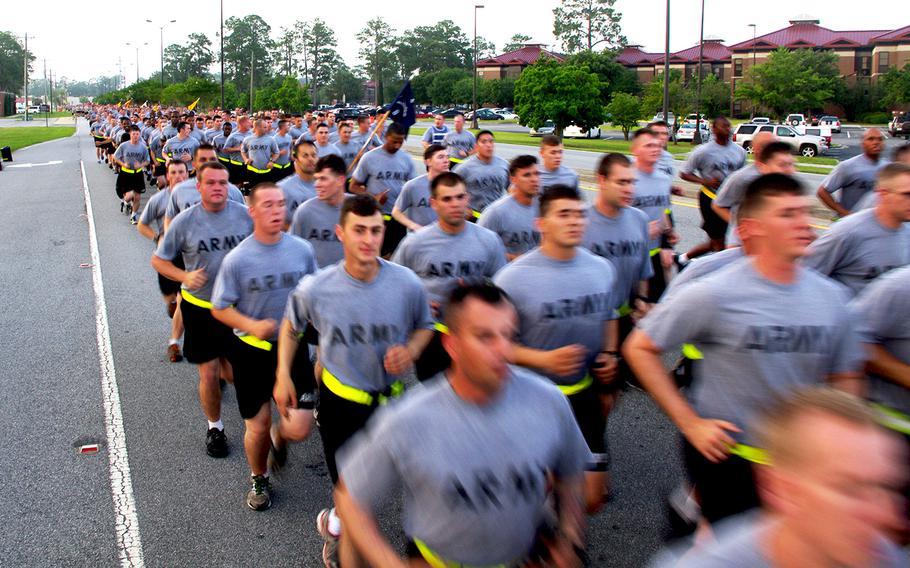 Soldiers of the 3rd Infantry Division participate in an esprit de corps run around Fort Stewart, Ga., on June 13, 2014.