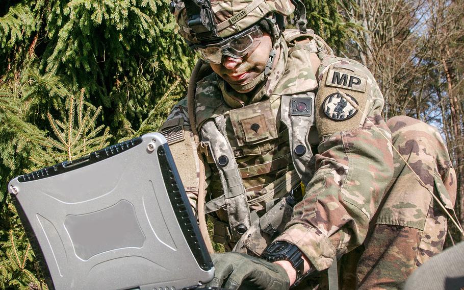 The Army Futures Command is developing wearable authentication tokens that will enable soldiers to prove their identity when operating systems, devices and applications on the Army tactical network. Here, Spc. William Ritter sets up software during Allied Spirit VIII at Hohenfels, Germany, Jan. 26, 2018. 