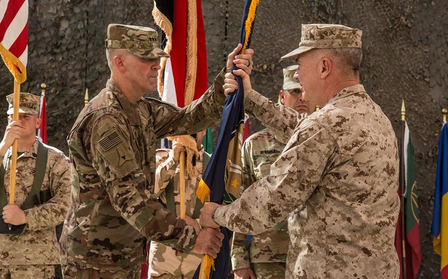 U.S Marine Corps Gen. Kenneth McKenzie, right, transfers authority of the Combined Joint Task Force- Operation Inherent Resolve to U.S. Army Lt. Gen. Robert White, leader of III Armored Corps, at the CJTF-OIR transfer-of-authority ceremony in Baghdad on Saturday, Sept. 14, 2019. The U.S. Army’s XVIII Airborne Corps, deployed from Fort Bragg, N.C. to areas in Southwest Asia, transferred its command authority to the III Armored Corps, deployed from Fort Hood, Texas.