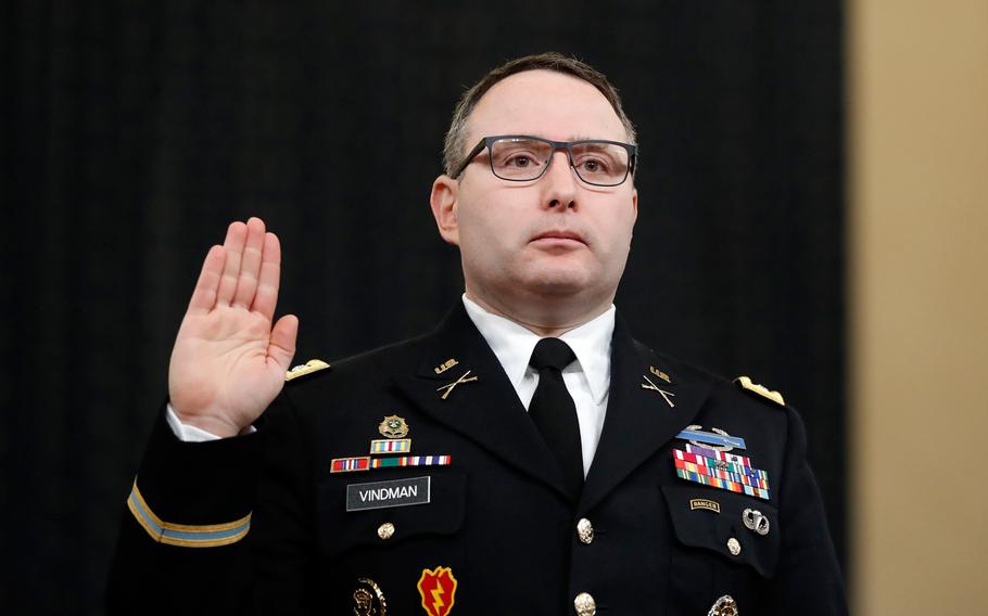 In this Nov. 19, 2019, file photo National Security Council aide Lt. Col. Alexander Vindman is sworn in to testify before the House Intelligence Committee on Capitol Hill in Washington.