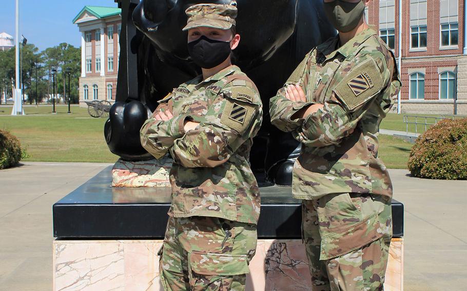 Army 1st Lt. Trisha Burden, right, and 2nd Lt. Amanda Atkinson, both assigned to 9th Brigade Engineer Battalion, 2nd Armored Brigade Combat Team, 3rd Infantry Division, pose for a photo on Fort Stewart, Ga., on April 7, 2021. They will compete in 14th annual Lt. Gen. Robert B. Flowers Best Sapper Competition at Fort Leonard Wood, Mo., on May 1-3, 2021. 