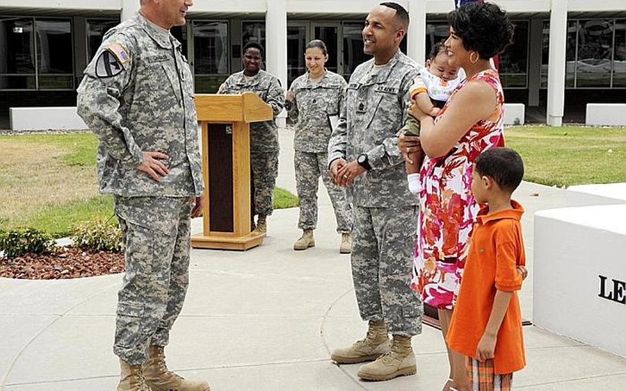Sgt. Maj. Raymond Chandler will be sworn in as the 14th Sergeant Major of the Army at the Pentagon on Tuesday. Pictured here in 2010 speaking with a soldier and his family, Chandler will become the Army Chief of Staff's top advisor for all enlisted matters in his new position.