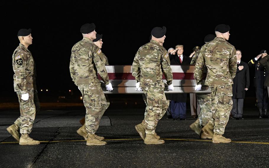 A U.S. Army carry team transfers the remains of Sgt. 1st Class Javier J. Gutierrez, of San Antonio, Texas,  at Dover Air Force Base, Del., Feb. 10, 2020.