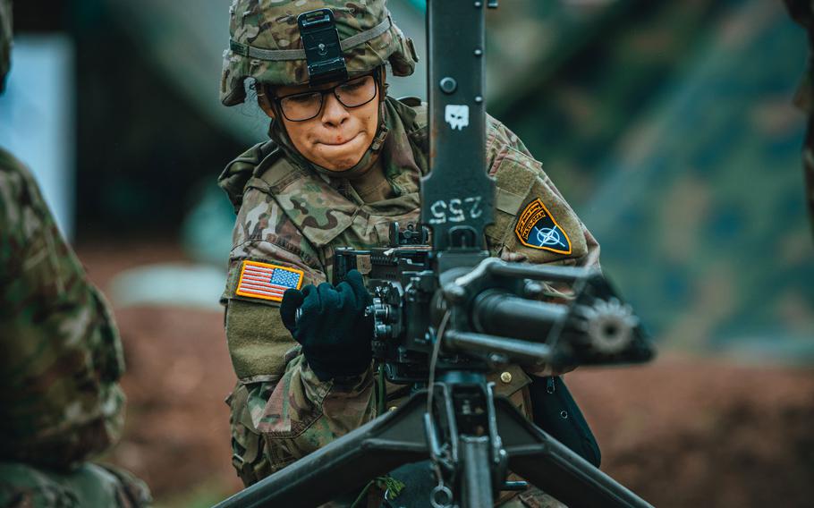 Army Sgt. Yulema Cortez, 2nd Cavalry Regiment, operates a M2 .50-caliber machine gun as part of preliminary training for the Expert Infantryman Badge and the Expert Soldier Badge in Bemowo Piskie, Poland, March, 19, 2020.