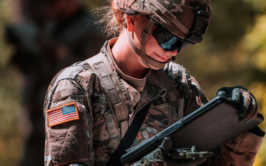 A soldier assigned to the 2nd Cavalry Regiment reviews a map while testing for the Expert Infantryman Badge and the Expert Soldier Badge in Vilseck, Germany, June 1, 2020.