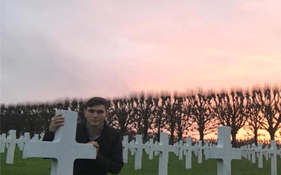 Sgt. Cade Pendergraft visits the grave of his great-grandfather Capt. Joseph Gray Duncan, Jr., in the Meuse-Argonne American Cemetery in France. The 173rd Airborne Brigade memorialized Pendergraft, who died in a hiking accident in Italy in September, in a ceremony Oct. 16, 2020.