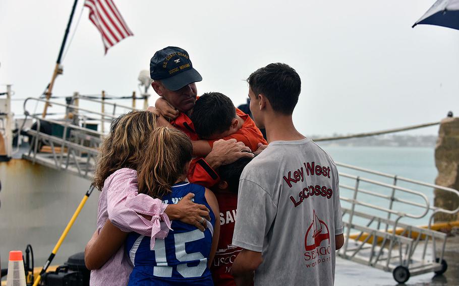 Coast Guard Capt. Craig J. Wieschhorster, commanding officer of the Coast Guard Cutter Mohawk, greets his family on the pier April 22, 2017, in Key West, Florida, following a three-month patrol in the Eastern Pacific. 