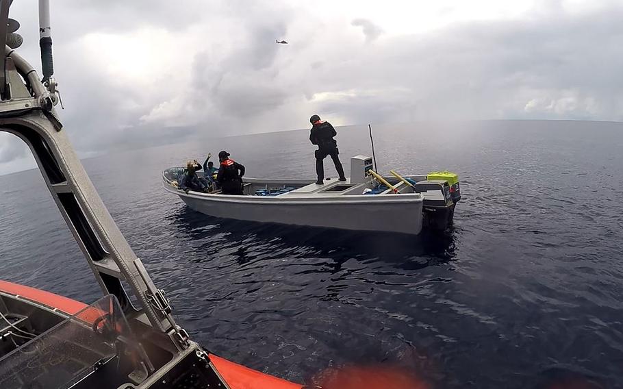 Boarding team members from the Coast Guard Cutter Mohawk interdict suspected smugglers in the Eastern Pacific in February 2017.