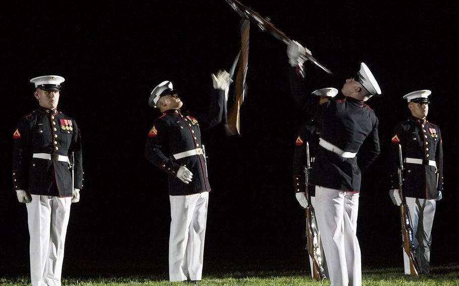 The Marine Corps' Silent Drill Platoon at the evening parade at Marine Barracks Washington, June 27, 2014.