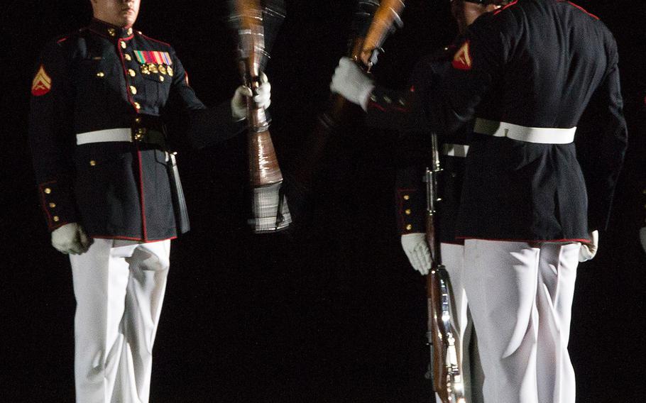 The Marine Corps' Silent Drill Platoon at the evening parade at Marine Barracks Washington, June 27, 2014.