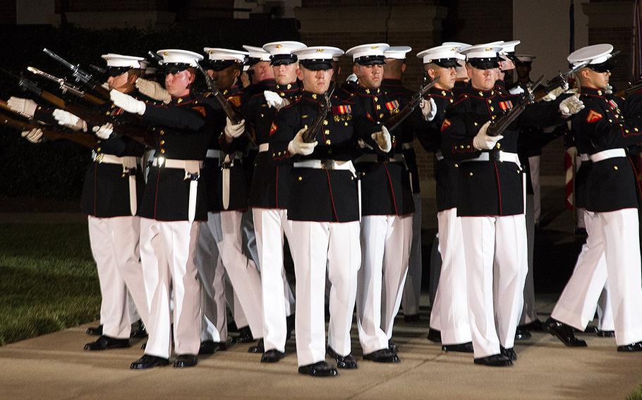 The Marine Corps' Silent Drill Platoon at the evening parade at Marine Barracks Washington, June 27, 2014.