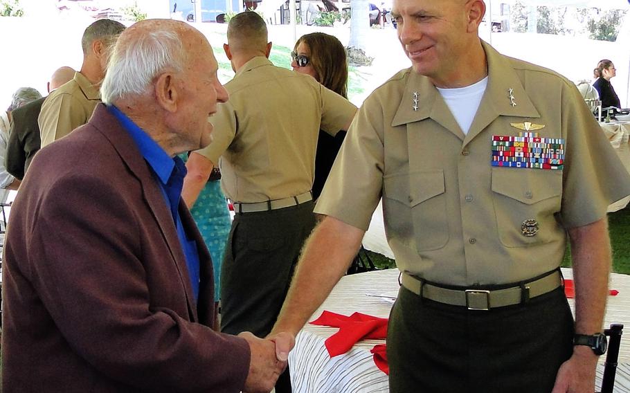 Lt. Gen. David Berger takes the flag of I Marine Expeditionary Force from Lt. Gen. John Toolan on Friday, as Berger took command of the unit at a ceremony at Camp Pendleton, Calif. 