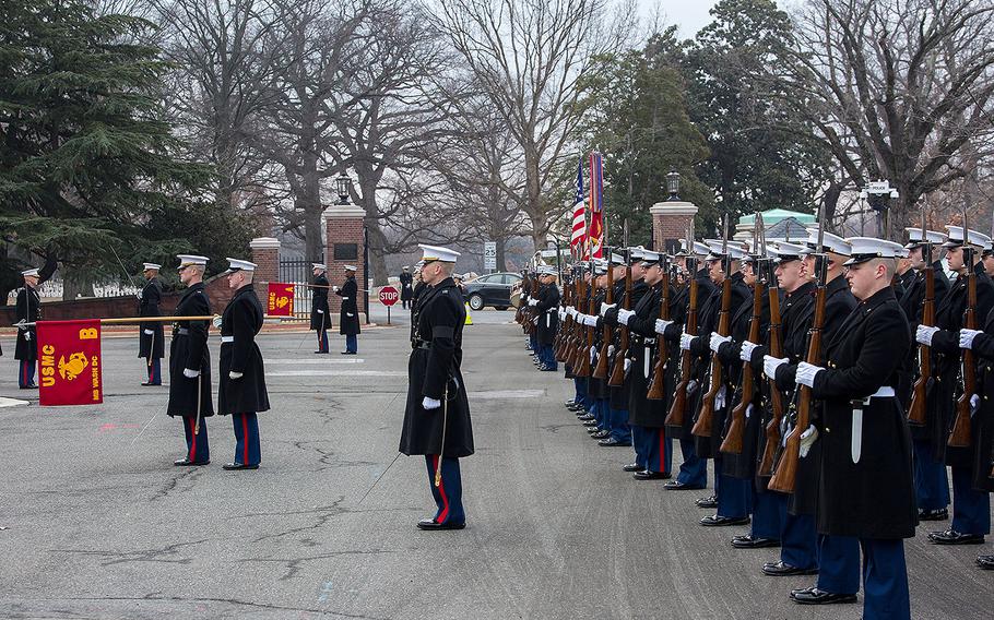 Marines with Marine Barracks Washington D.C. render honors during a full honors funeral for Maj. Gen. Paul A. Fratarangelo at Arlington National Cemetery, Arlington, Va., Jan. 16, 2018.  