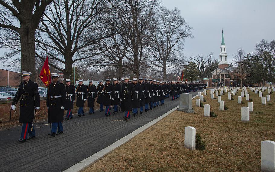 Marines with Marine Barracks Washington D.C. march in formation during a full honors funeral for Maj. Gen. Paul A. Fratarangelo at Arlington National Cemetery, Arlington, Va., Jan. 16, 2018. 
