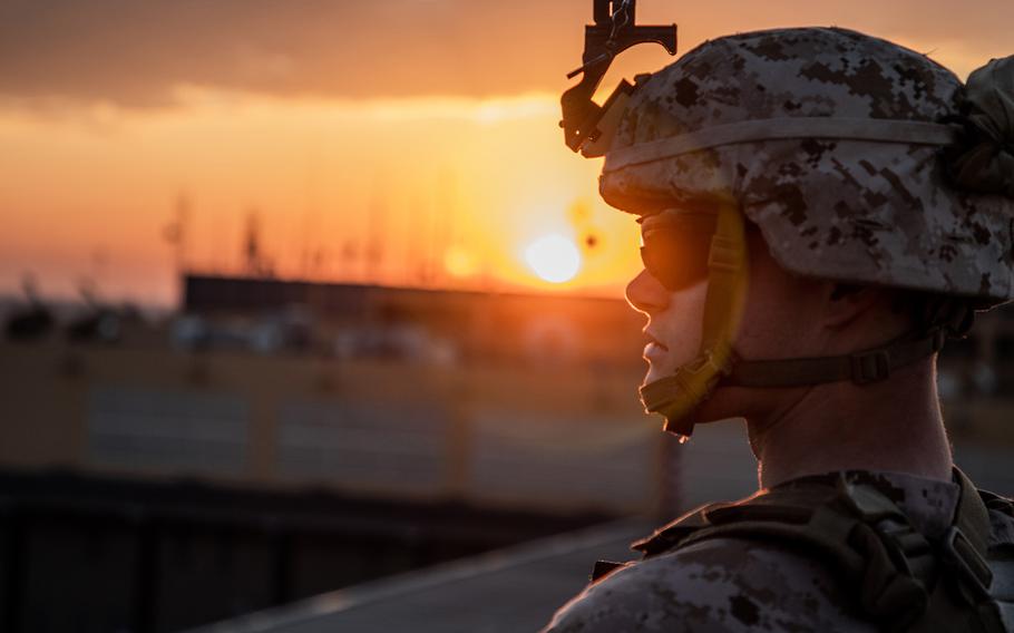 A U.S. Marine with 2nd Battalion, 7th Marines, assigned to the Special Purpose Marine Air-Ground Task Force-Crisis Response-Central Command 19.2, stands post during the reinforcement of the Baghdad Embassy Compound in Iraq, Jan. 4, 2020. 