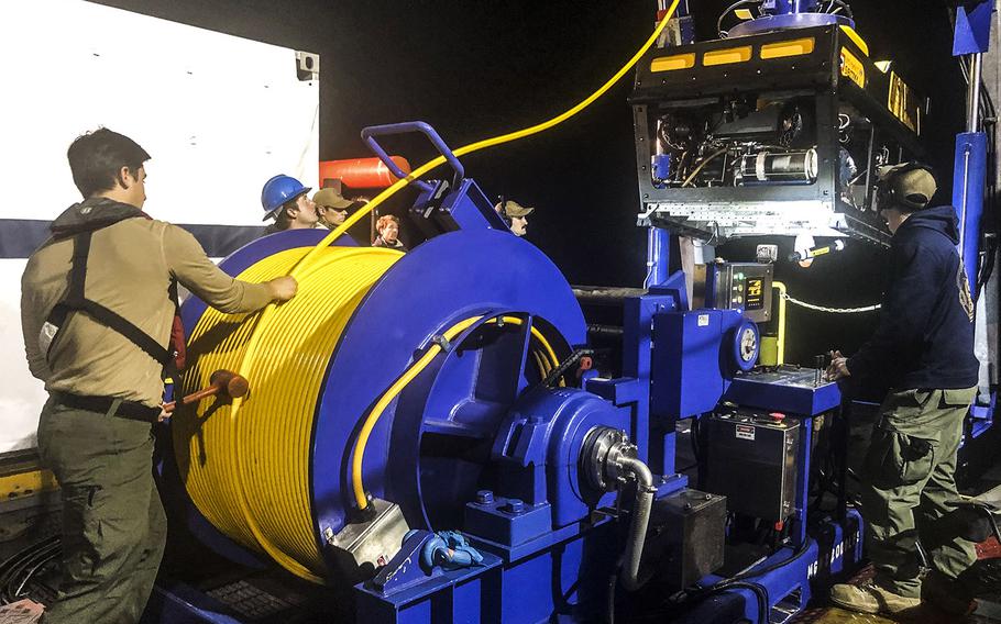 Undersea Rescue Command deploys the Sibitzky Remotely Operated Vehicle from the deck of the Military Sealift Command-chartered merchant vessel HOS Dominator in the Pacific Ocean, on Monday, Aug. 3, 2020, during recovery efforts for the missing seven Marines and one sailor from the 15th Marine Expeditionary Unit.