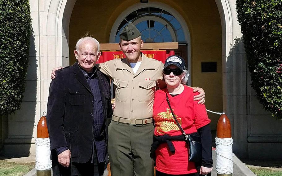Pfc. Evan Bath with his grandparents, Larry and Linda Williamson, at his graduation from boot camp in 2019 at Marine Corps Recruit Depot, San Diego, Calif. 