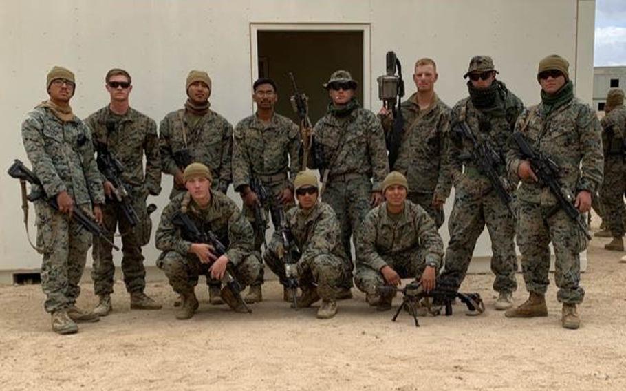 Marine Pfc. Evan Bath, front left, with other members of Bravo Company, Battalion Landing Team 1/4.