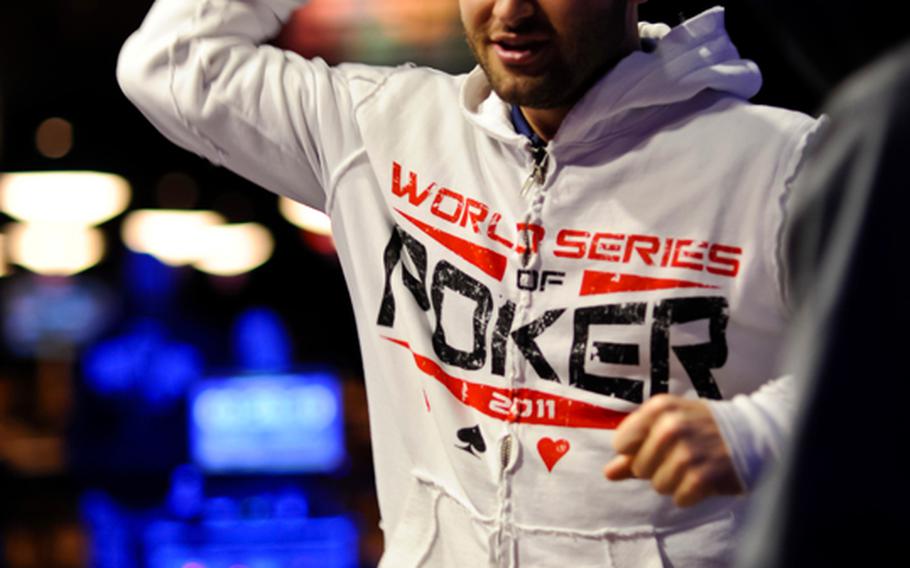Ken Griffin celebrates after eliminating a player from the final table at Event 45 of the World Series of Poker in Las Vegas, June 28. Griffin, a former Marine, took home $455,356 for first prize in the tournament, which started with 2,890 entrants.