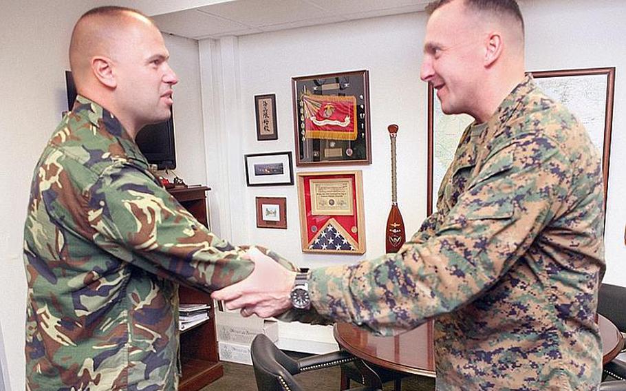 Bulgarian Col. Lavor Mateev, left, meets with Brig. Gen. Charles Chiarotti, deputy commander of Marine Forces Europe, at Panzer Kaserne in Stuttgart, Germany, on Dec. 14, 2011, as part of a three-day planning conference focused on the Marines' upcoming mission in eastern Europe. The Marines' Black Sea Rotational Force, a six-month mission involving 19 countries, launches in March. 
