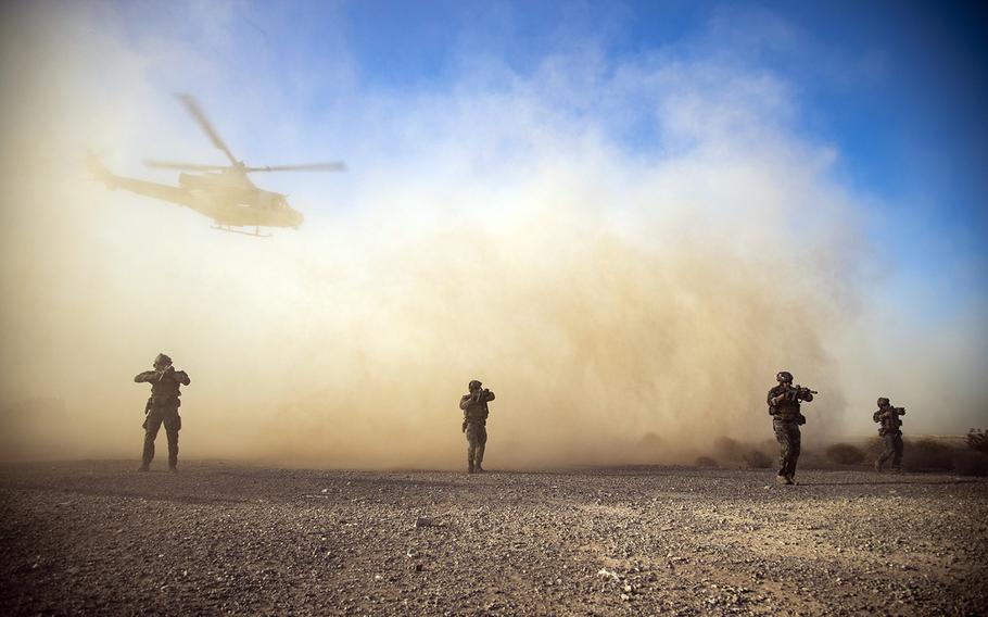 Members of Marine Forces Special Operations Command take part in an exercise during a weapons and tactics course at Yuma Proving Ground, Ariz., Oct. 8, 2019.