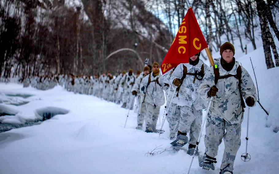 U.S. Marines with Charlie Company, 2nd Law Enforcement Battalion, II Marine Expeditionary Force Information Group, conduct a 3-mile hike using snowshoes during cold-weather training near Bjerkvik, Norway, on Sunday, March 8, 2020. The Marines are in Norway for exercise Cold Response, but the exercise has been canceled because of the new coronavirus outbreak.