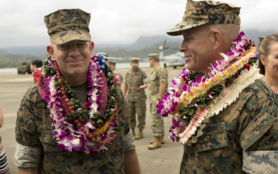 Lt. Gen. Lewis Craparotta, right, speaks with Lt. Gen. David Berger after taking command of Marine Corps Forces Pacific in Hawaii, Aug. 8, 2018. Berger is now the service's commandant.