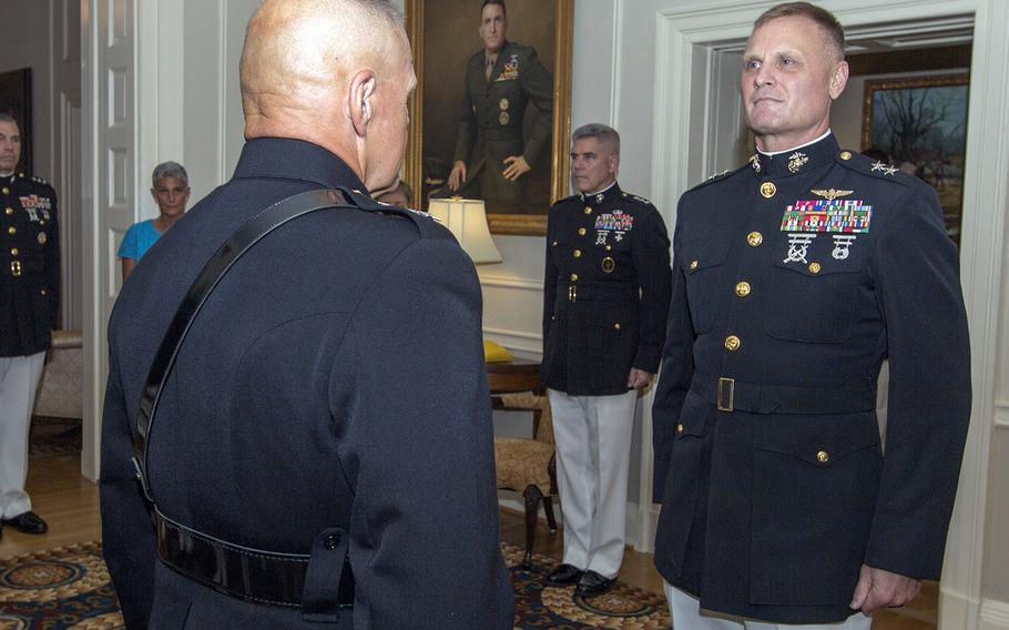 Steven Rudder, right, is promoted to lieutenant general by Marine Corps commandant Gen. Robert Neller at Marine Barracks Washington, Washington, D.C., July 10, 2017.