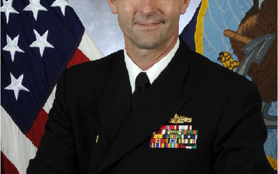 Cmdr. Mark Olson