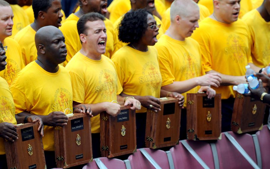 Chief petty officer selects show their pride and spirit during CPO Day in 2009.
