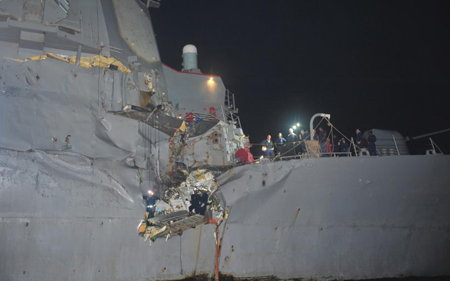 Guided-missile destroyer USS Porter is damaged in a collision with the Japanese owned bulk oil tanker M/V Otowasan in the Strait of Hormuz on Aug., 12, 2012. No personnel on either vessel were reported injured. Porter is on a scheduled deployment to the U.S. 5th Fleet area of responsibility conducting maritime security operations and theater security cooperation efforts. 